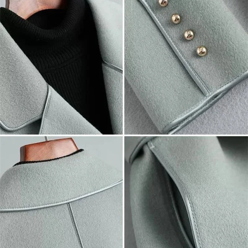 Light blue-gray overcoat with stand collar, decorative buttons, and curved hem