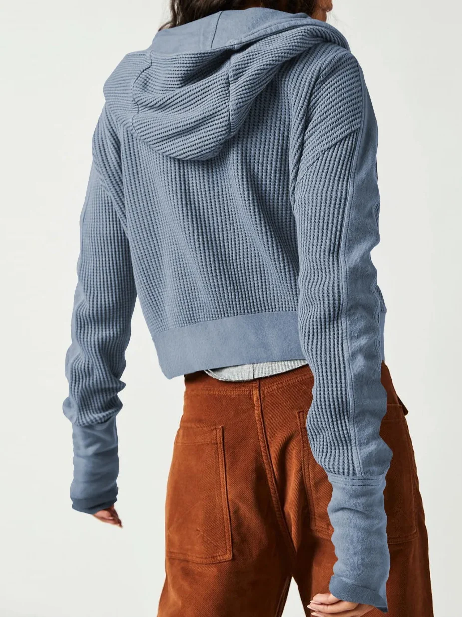Blue waffle knit zip hoodie with hood and ribbed hem; back view.