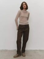 Lightweight crewneck knit sweater in light beige, fitted sleeves with ribbed cuffs