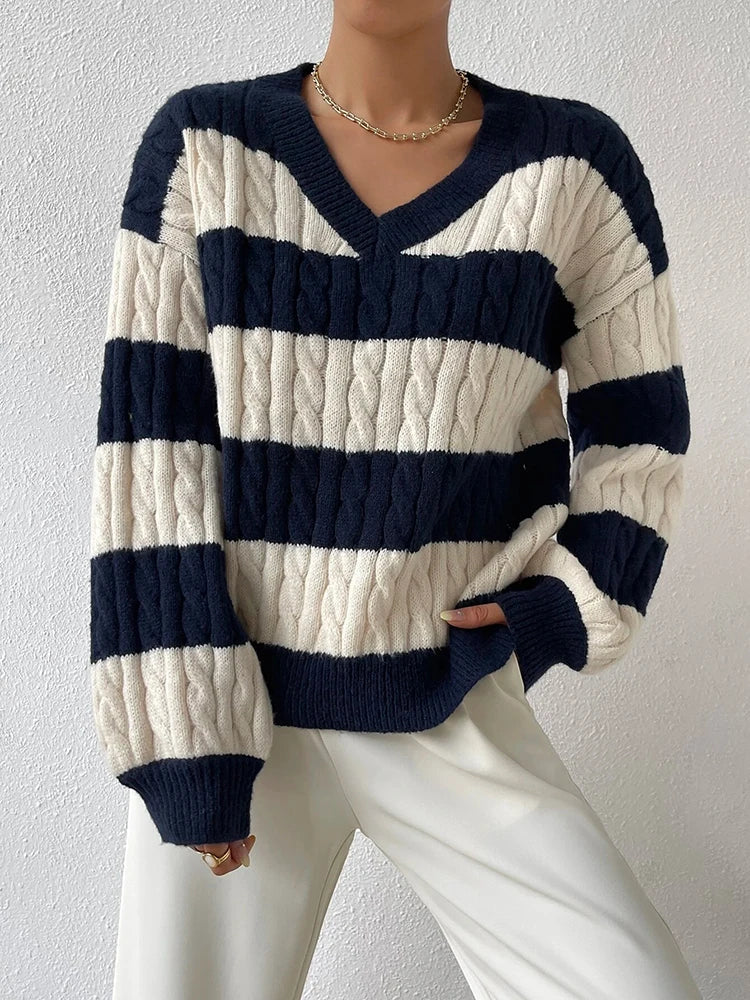Cream and navy striped V-neck knit sweater with ribbed cuffs and hem