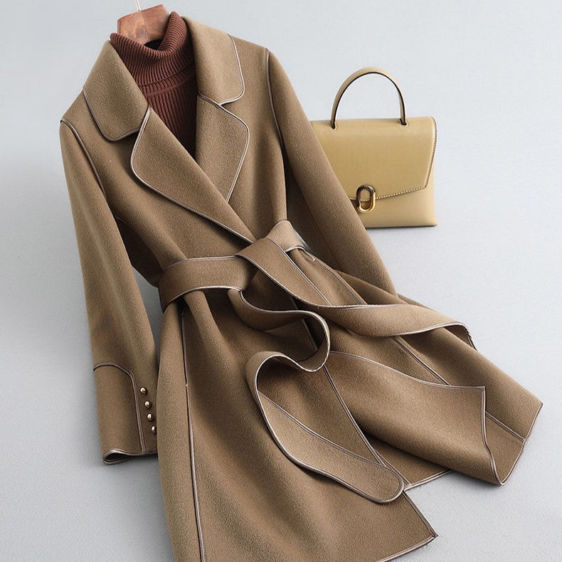 Camel khaki overcoat with notch lapels, belt tie, and flap pockets; clean seams.