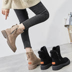 Suede winter boots in beige and black with faux-fur lining, side zippers, treaded soles