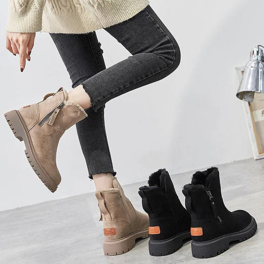 Suede winter boots in beige and black with faux-fur lining, side zippers, treaded soles