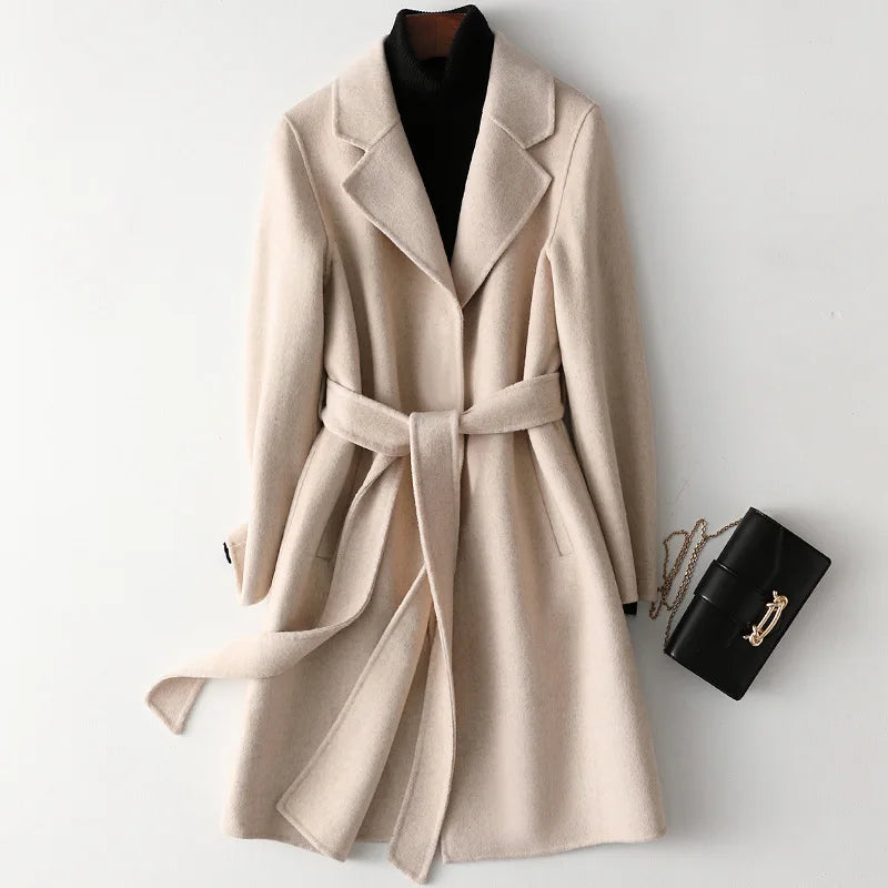 Wool belted midi coat in ivory with notched lapels and waist tie belt