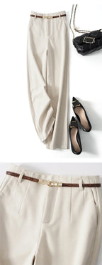 White high-waisted wide-leg wool blend trousers with brown belt and gold buckle detail