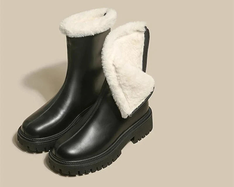 Black ankle boots with fleece trim at the shaft and platform lug sole