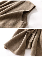 Women’s merino wool sweater vest hem and belt tie detail, camel knit