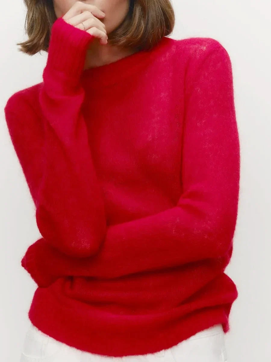 Bright red crewneck knit sweater, soft fuzzy knit and ribbed cuffs