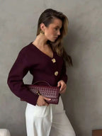 Women’s boxy V-neck cardigan sweater in burgundy with gold-tone buttons and long sleeves