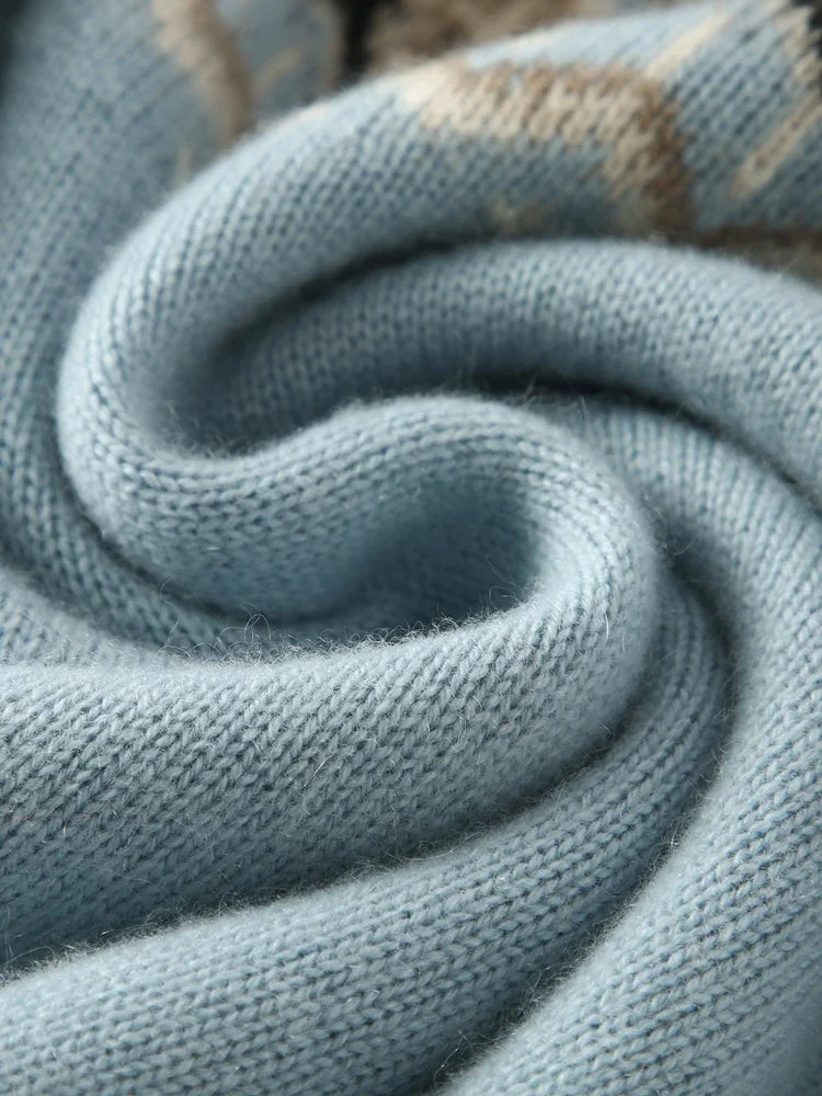 Soft sky blue knit fabric close-up with fine ribbed texture