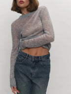 Heather grey crewneck knit sweater with long sleeves and ribbed hem