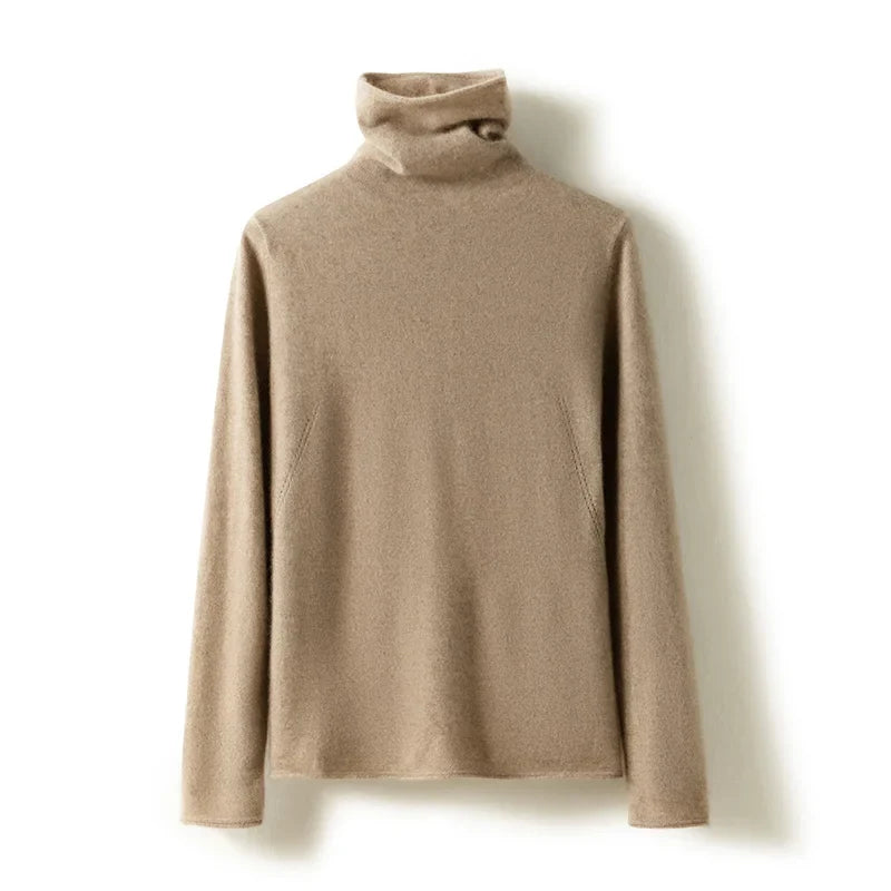 Camel slim fit turtleneck knit sweater on a hanger, folded collar and long sleeves.