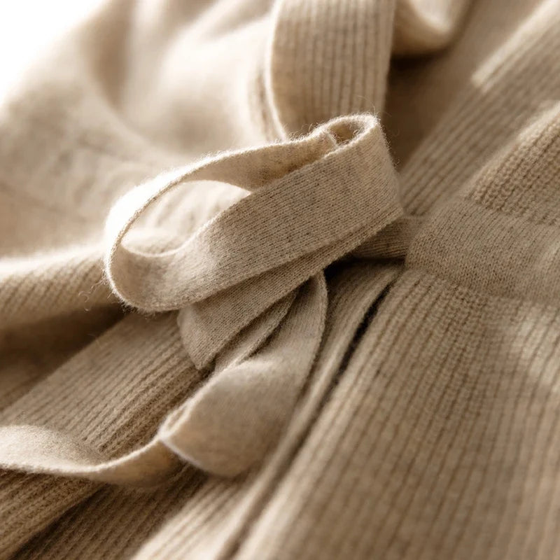 Women’s merino wool sweater vest tie detail, light beige rib-knit