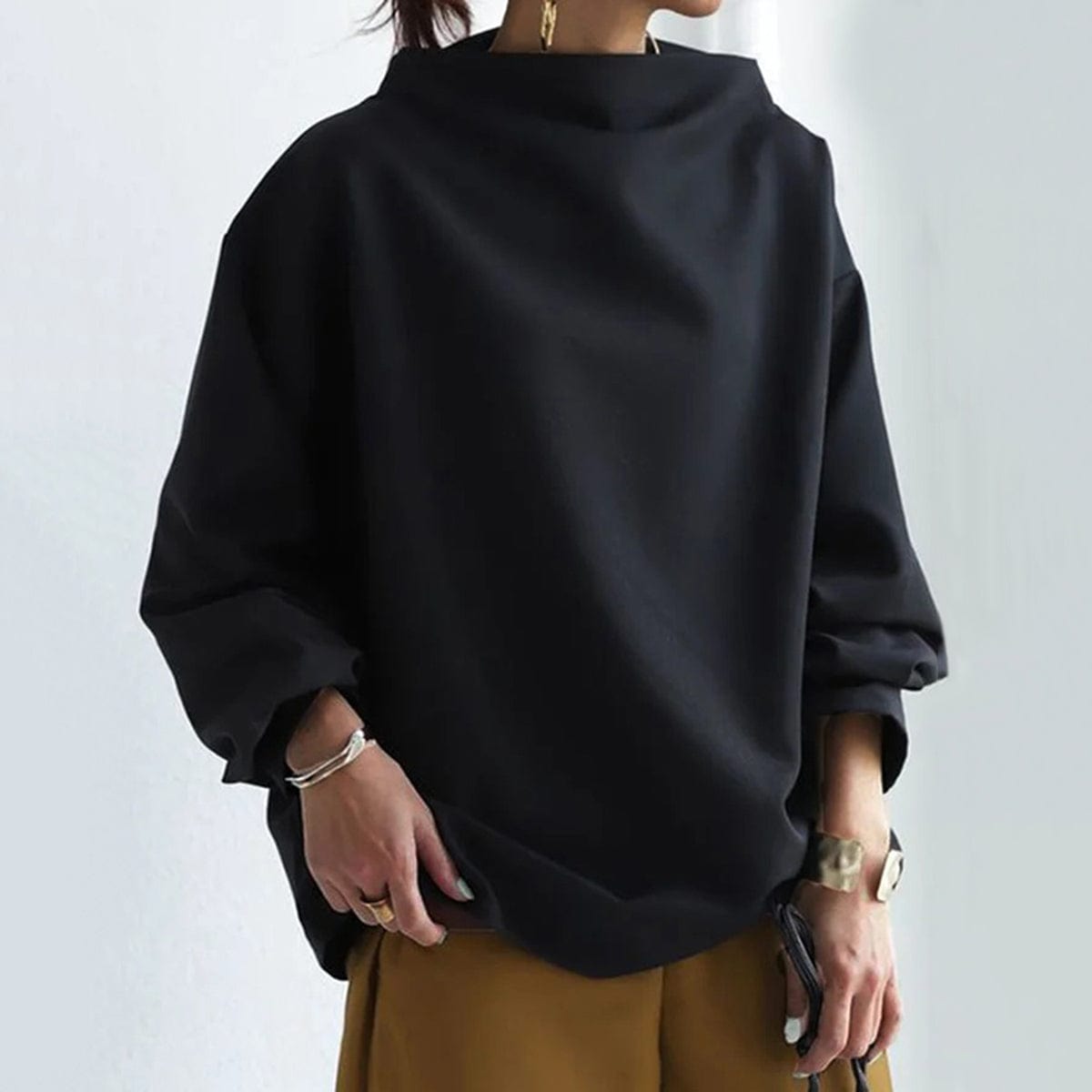 Black high-neck casual top with relaxed long sleeves and cowl neckline