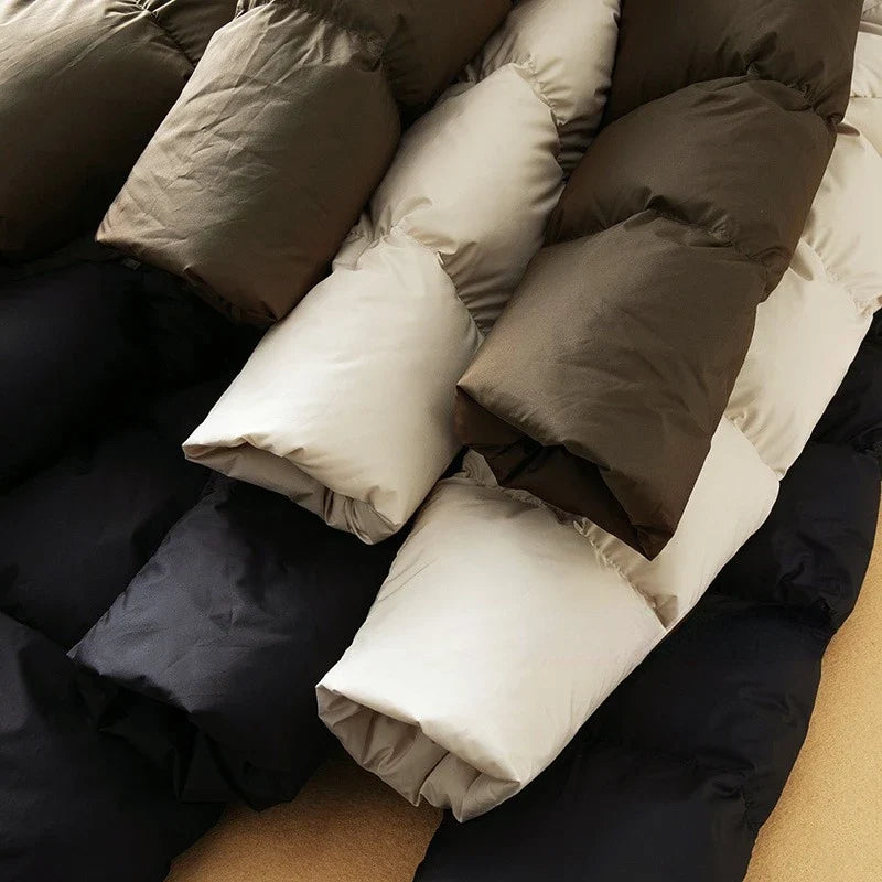 Long down puffer parka with hood, light coffee-beige quilted sleeves and body