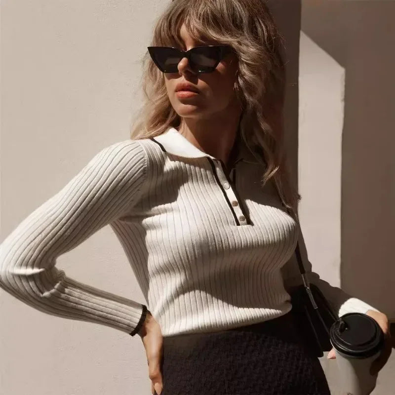 White ribbed knit zip sweater with zip-front placket and fitted long sleeves