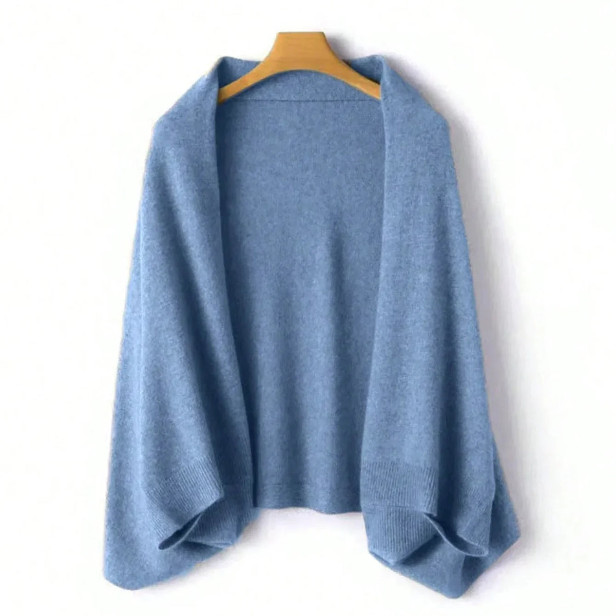 Blue wool shawl with open-front drape, knit texture, and hemmed ends