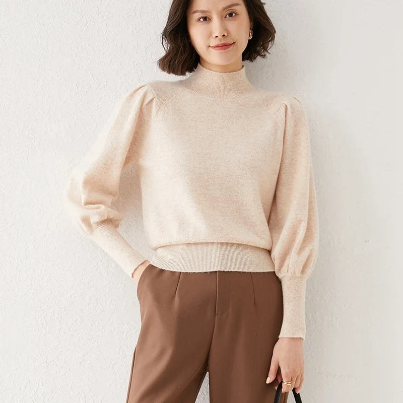 Beige merino turtleneck sweater with puff sleeves and ribbed cuffs