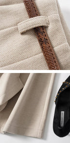 Light beige high-waisted wide-leg trousers with belt strap and belt loop detail