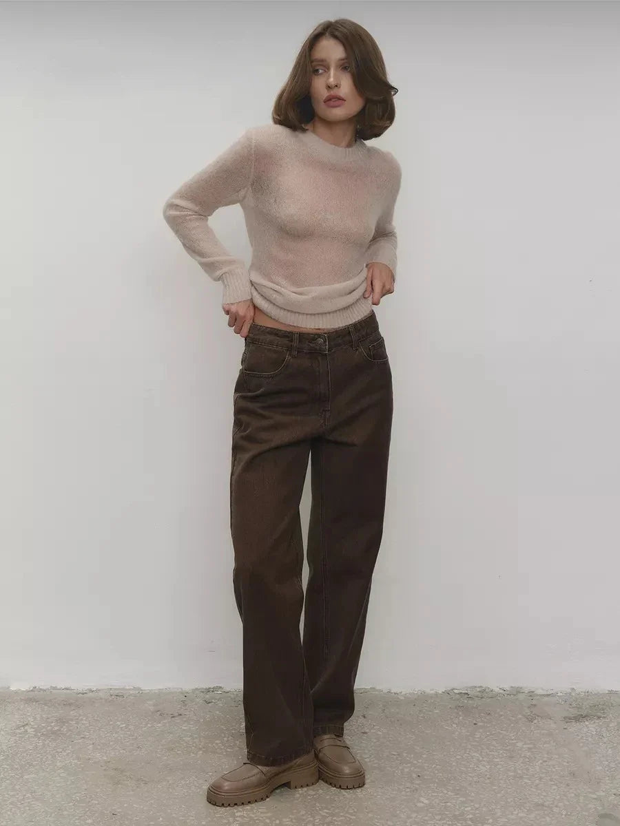 Lightweight crewneck knit sweater in light beige with long sleeves and ribbed trim