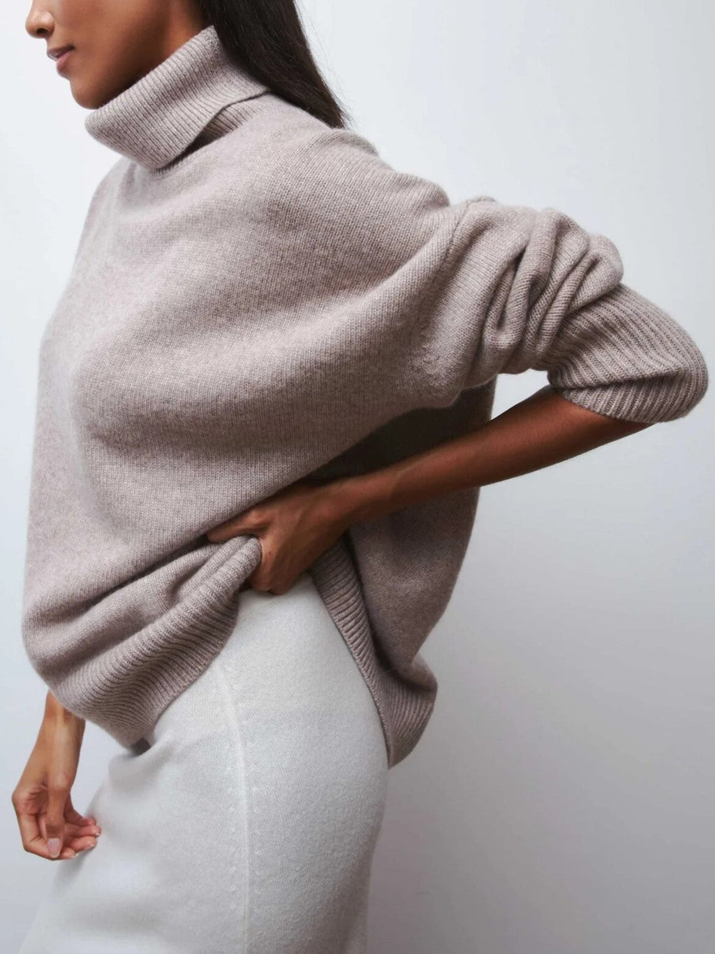 Beige oversized merino-wool blend turtleneck sweater, ribbed collar and cuffs