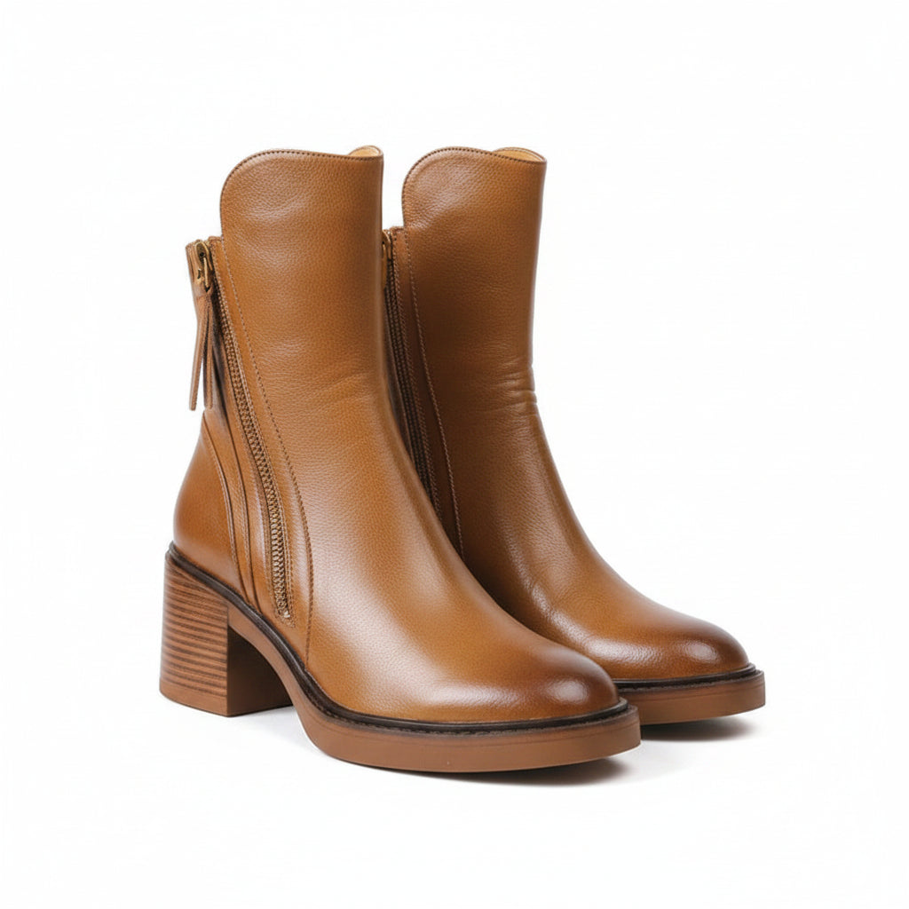 Brown ankle boot with side zipper, tassel pull, and stacked block heel