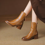 Brown ankle boots on block heels with side zippers and tassel ties