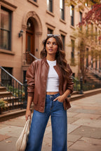 Brown leather zip-front jacket with stand collar and ribbed cuffs
