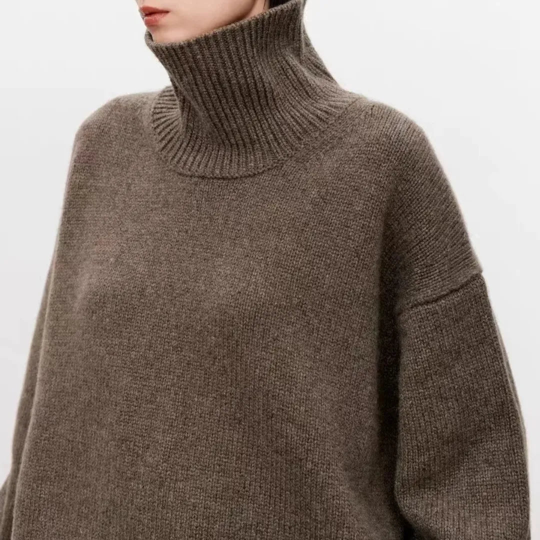 Brown oversized turtleneck knit sweater with ribbed collar and drop-shoulder fit