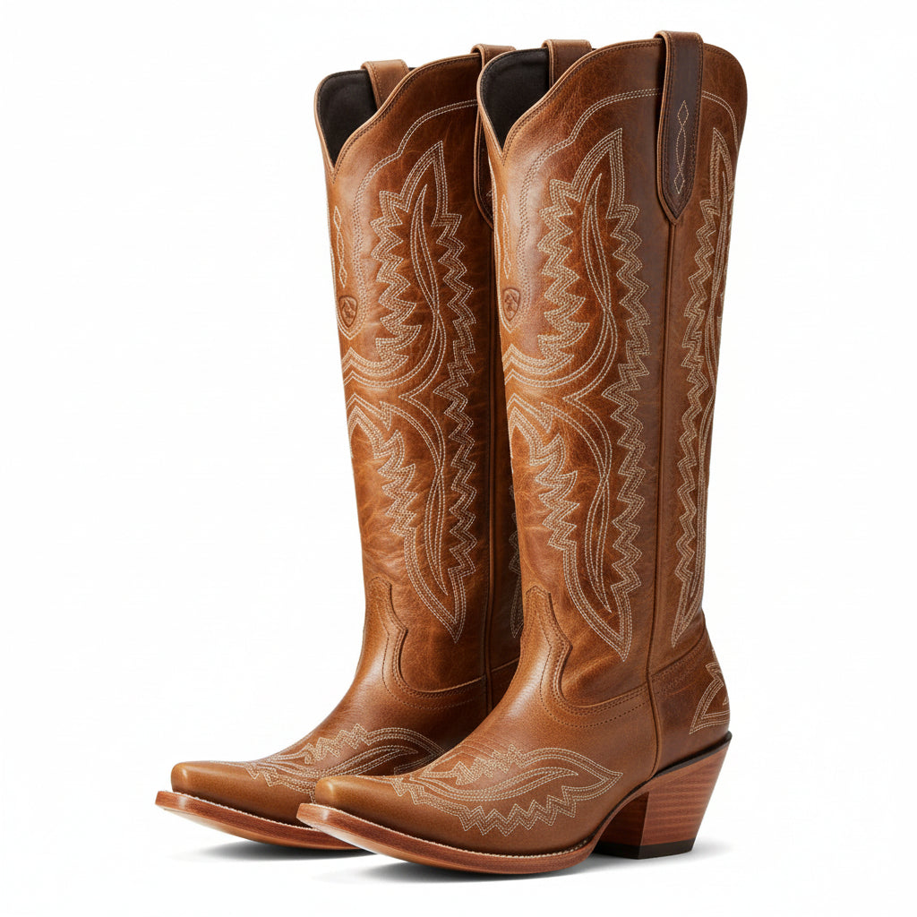 Brown cowboy boots with western stitched patterns, pointed toe, and stacked wood heel