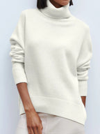 Cream oversized merino-wool blend turtleneck sweater, ribbed collar and cuffs