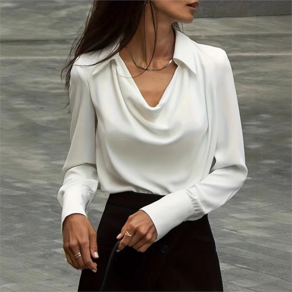 White 100% silk full-sleeve shirt, side view, draped V cowl neckline and long sleeves
