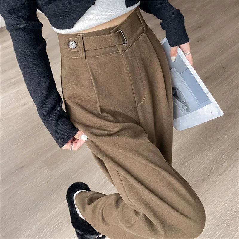 Women's high-rise wide-leg trousers, brown with belt loops and side pockets.