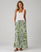 Green field-print A-line skirt with pockets, midi length, side view