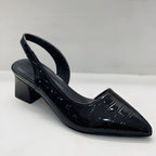 Black slingback heels with pointed toe, glossy patent texture, block heel