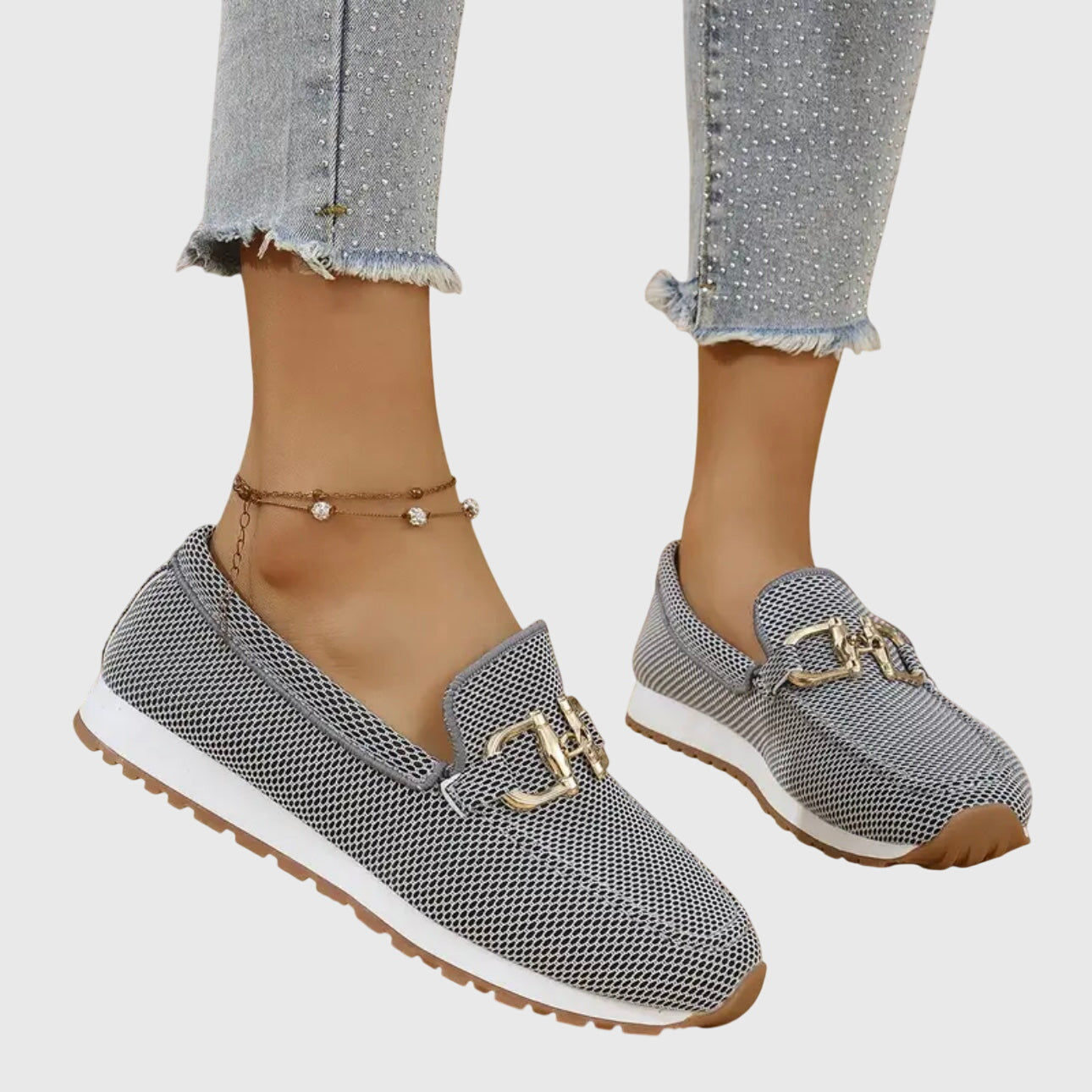 Gray orthopedic loafer shoes with textured knit upper and gold buckle-bit detail