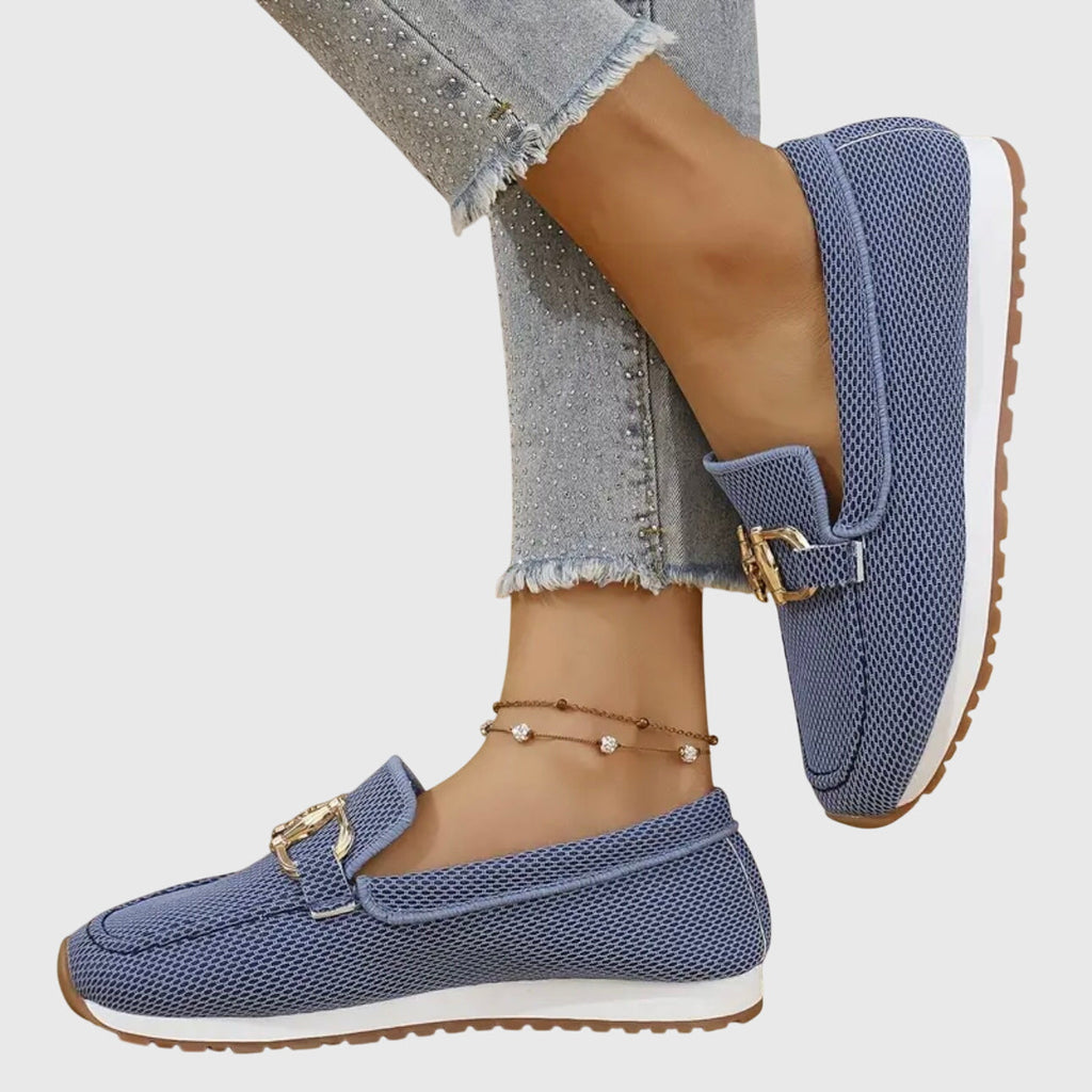 Blue slip-on orthopedic loafer shoes with textured knit and gold buckle-bit detail