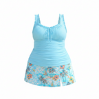 Plus size cyan tankini set with ruched drawstring top and floral skirted bottom