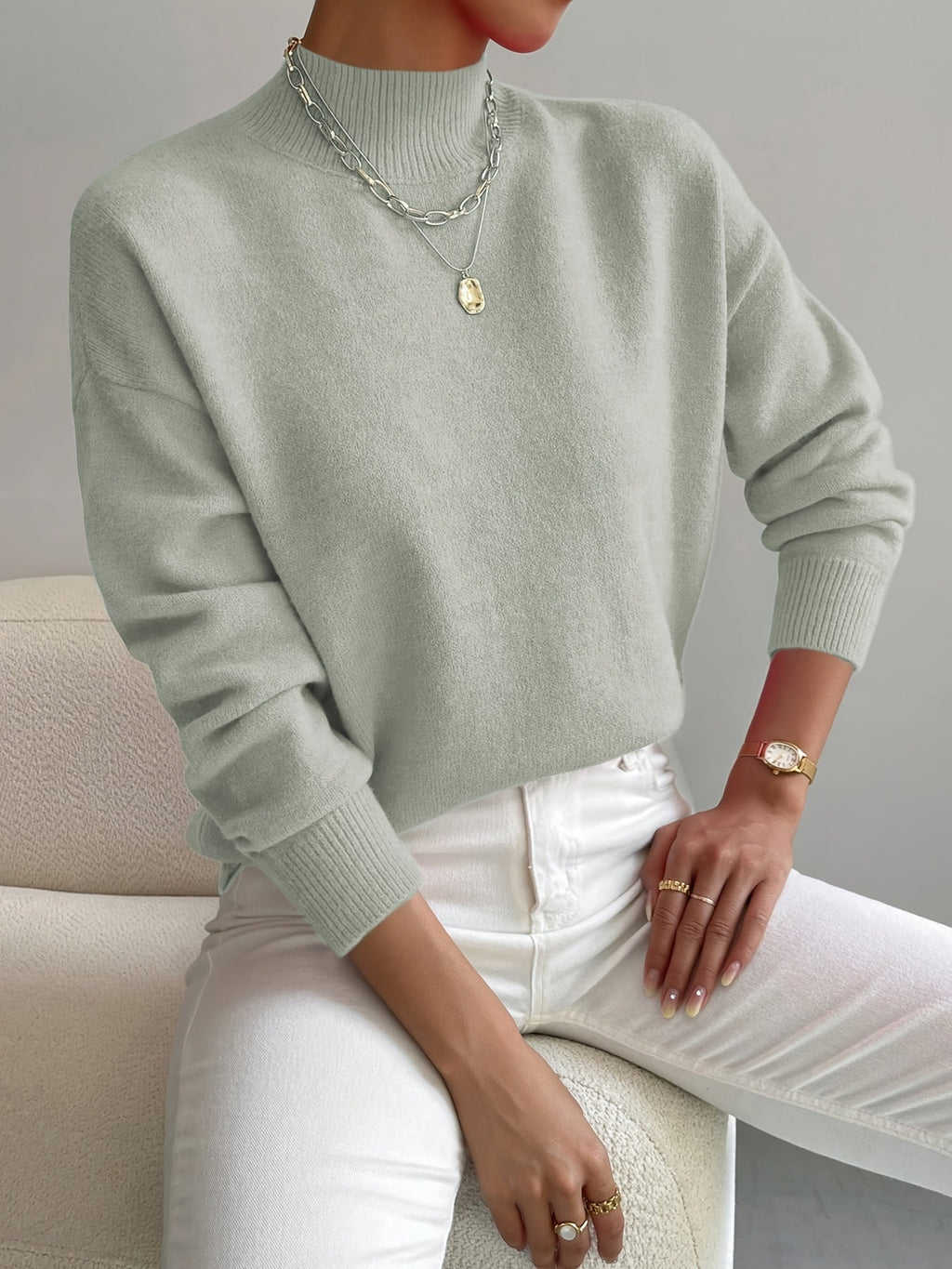 Women’s turtleneck knit sweater, light sage green with long sleeves