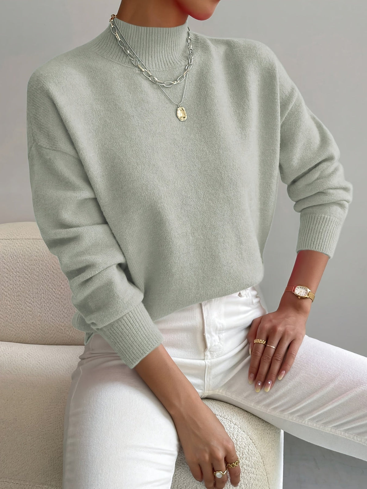 Women’s turtleneck knit sweater, light sage green with long sleeves