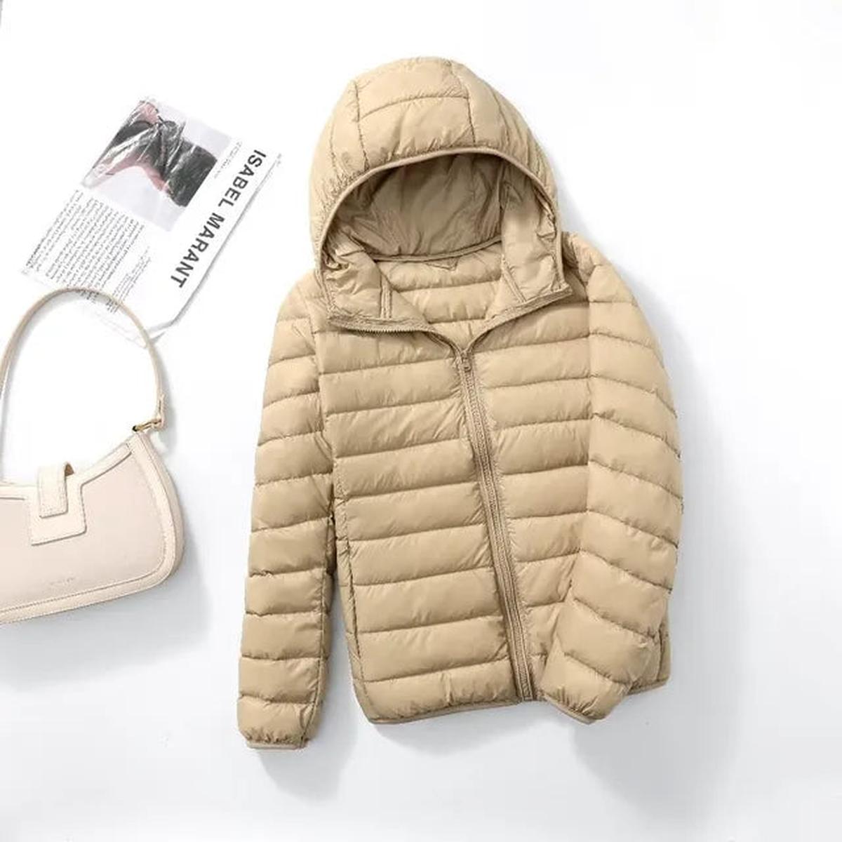 Hooded down jacket in light tan with full-zip front and quilted insulation baffles
