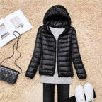 Hooded down jacket in black with full-zip front and quilted insulation baffles