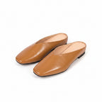 Brown leather flats with pointed toe, low heel, slip-on style