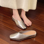 Silver leather flats with pointed toe, low heel, slip-on style