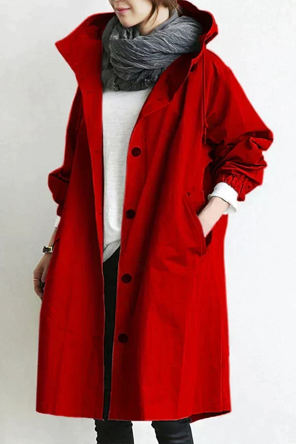 Red women's waterproof raincoat with oversized hood, button front, long sleeves