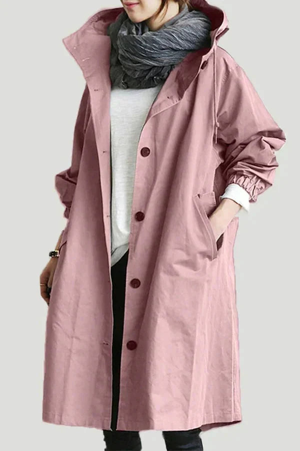 Rose-pink women's waterproof raincoat with oversized hood, button front, long sleeves