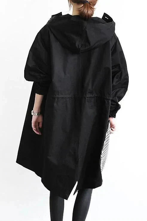 Black womens waterproof raincoat with oversized back hood and long sleeves