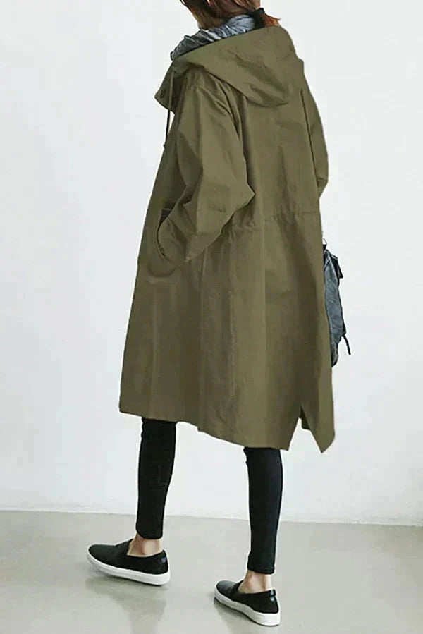 Olive green womens waterproof raincoat with oversized hood and long sleeves