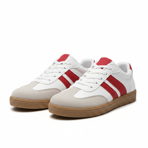 White low-top sneaker with red stripes, lace-up design, tan rubber sole.