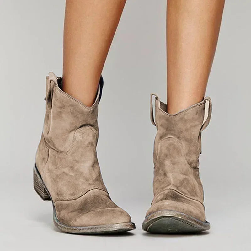 Taupe suede ranch boots with side pull tabs and low stacked heel